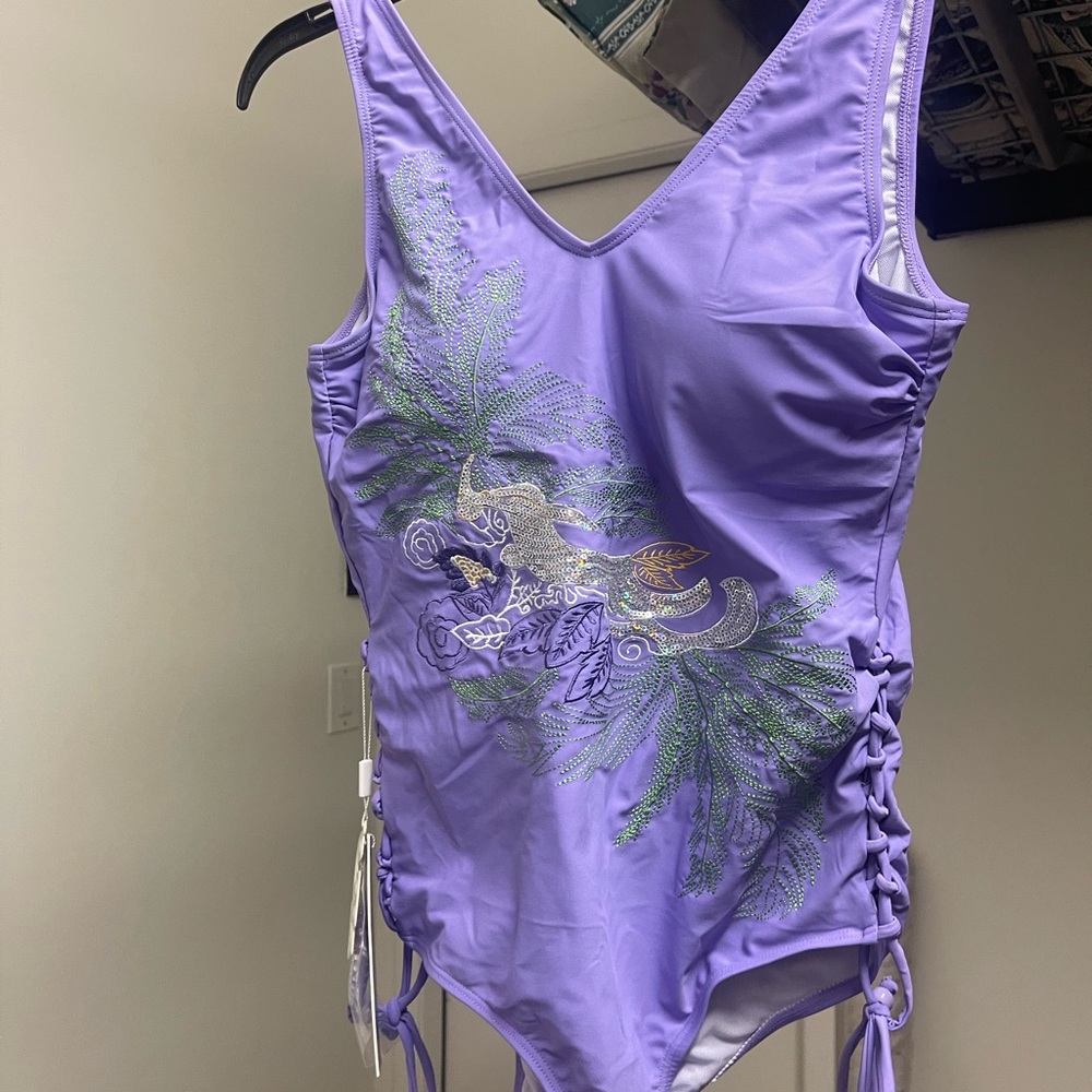 Purple One-Piece Swimsuit with Floral Design